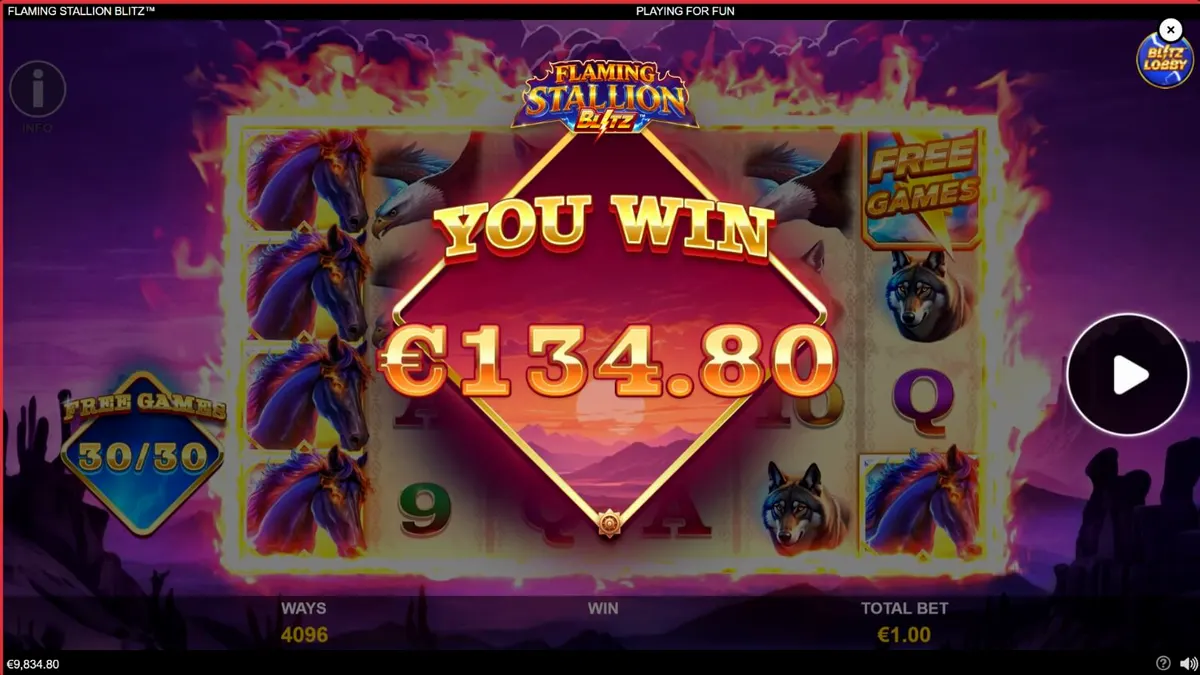 Isang naglalagablab na asul na kabayo na may kumikinang na orange na mga mata sa gitna ng isang disyerto na may paglubog ng araw, na sumisimbolo sa Flaming Stallion Blitz slot.
